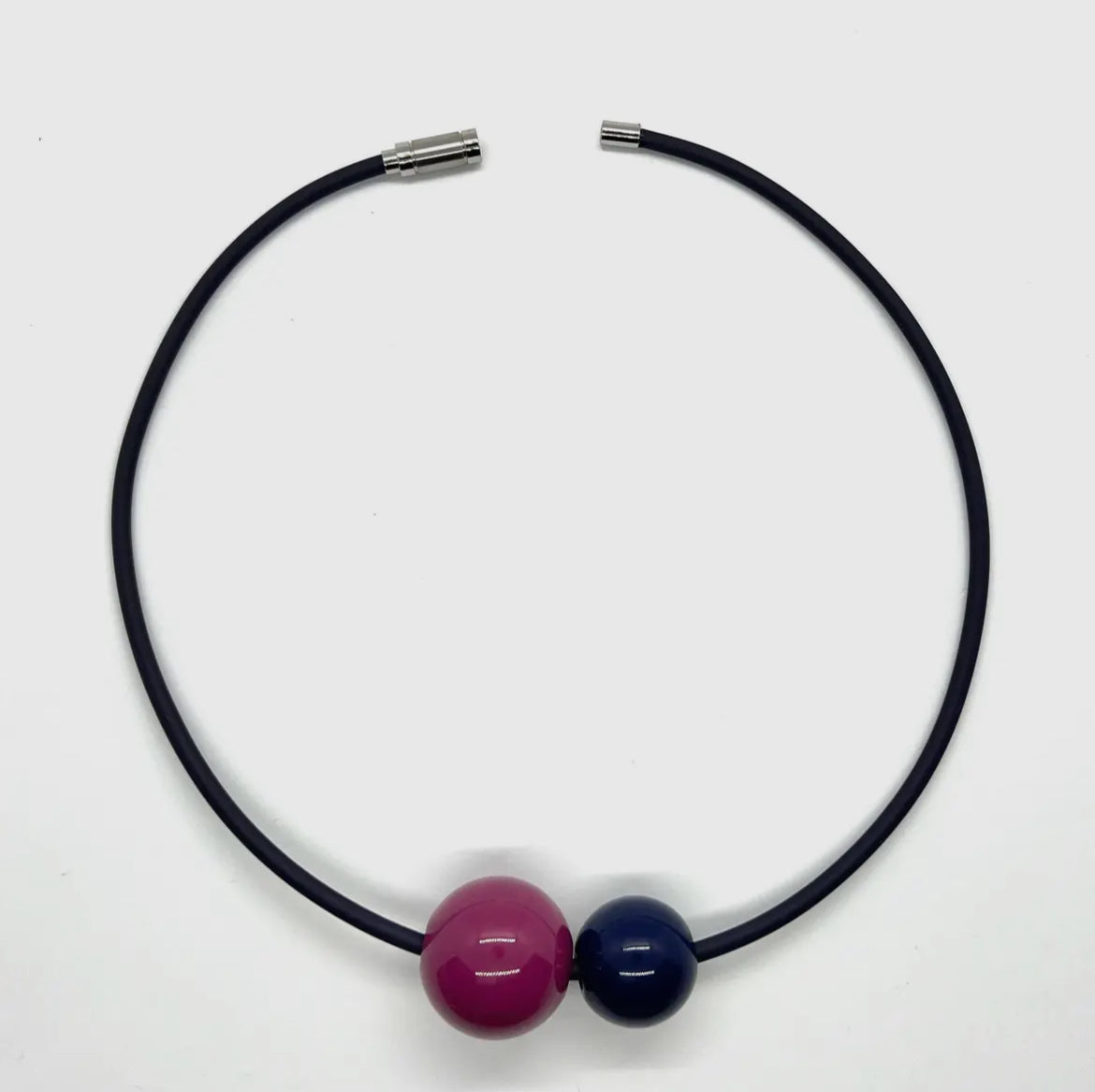 Black & Fuchsia Resin Beads On Rubber