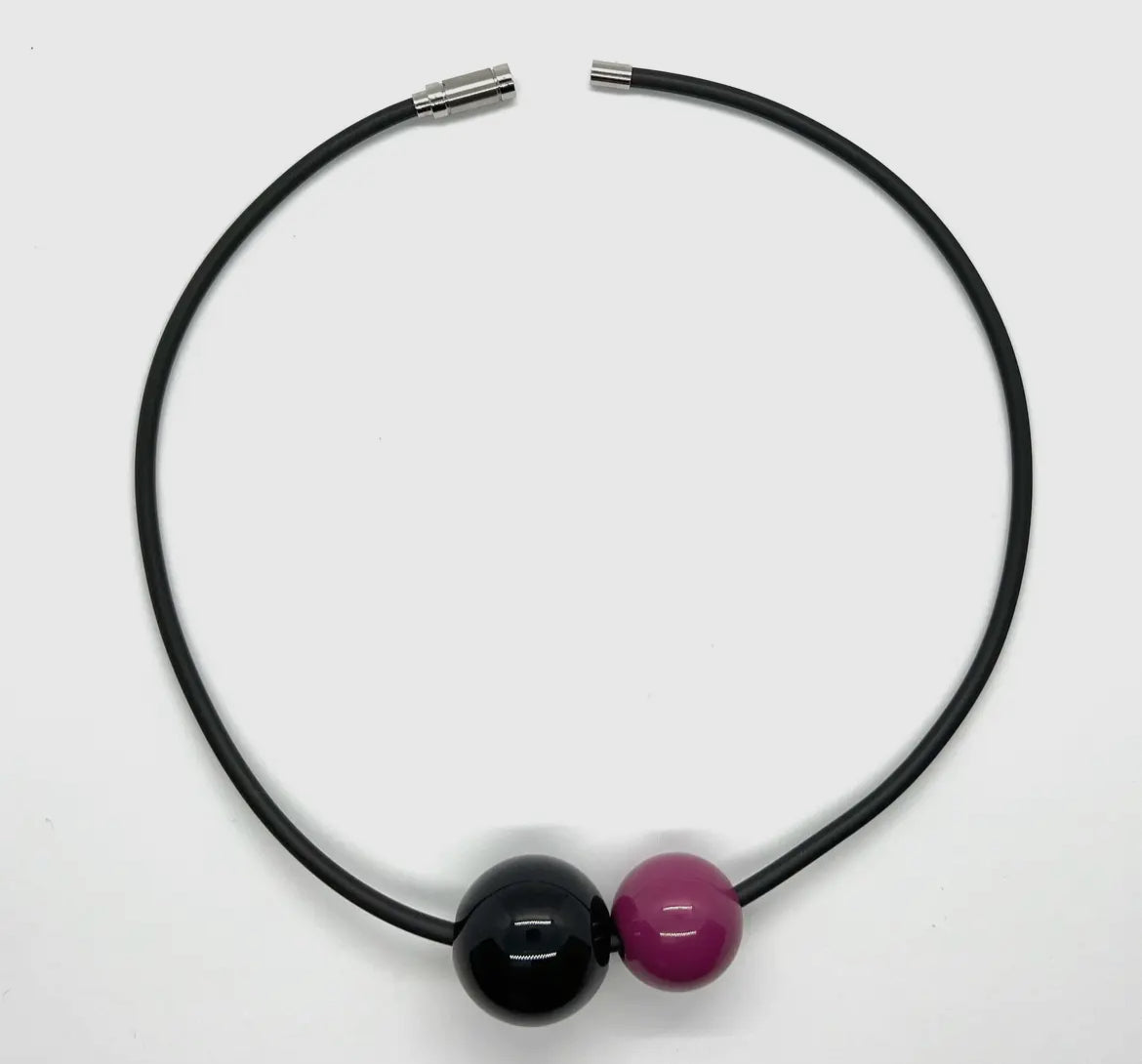 Black & Fuchsia Resin Beads On Rubber